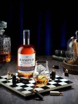 ASAVA with canister: ASAVA canister, Rampur ASAVA Indian Single Malt Whisky